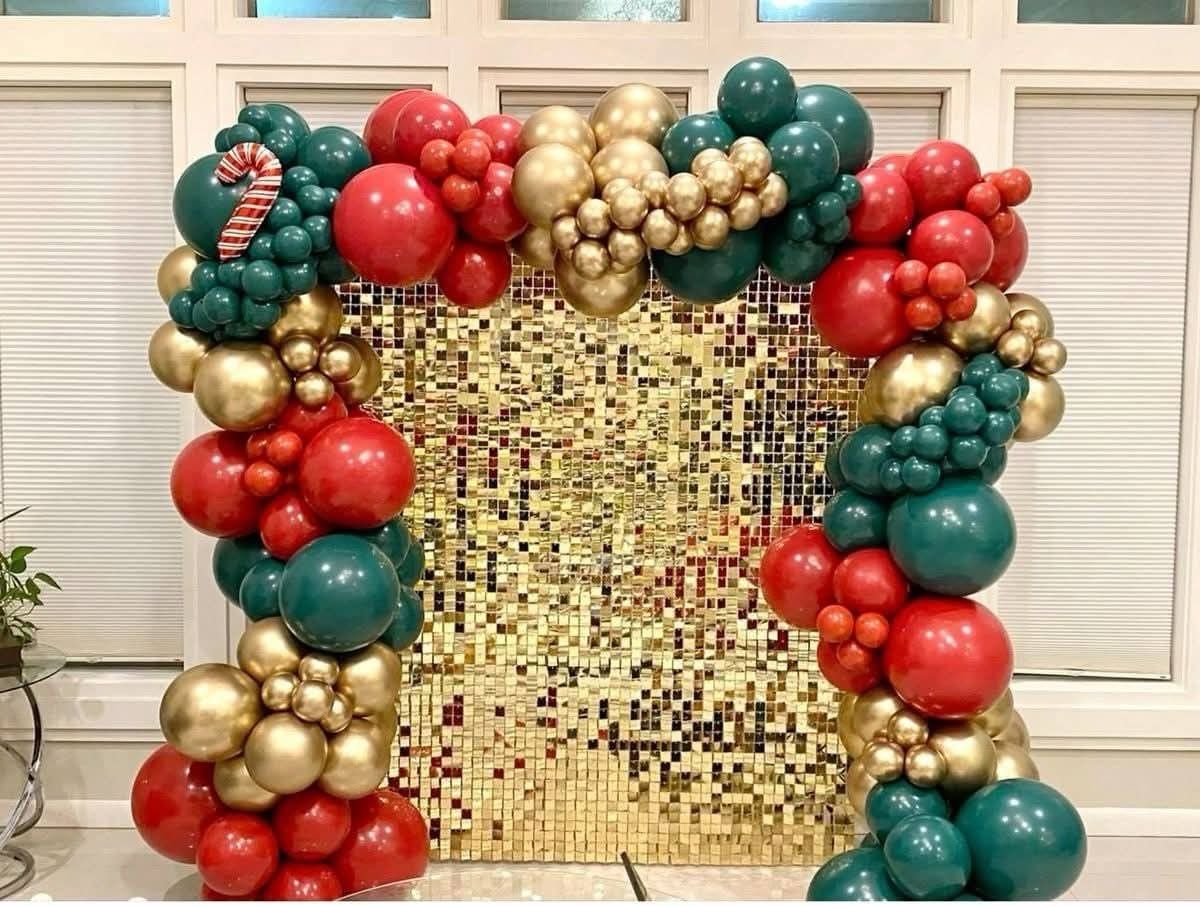 Red green and gold Christmas balloon backdrop