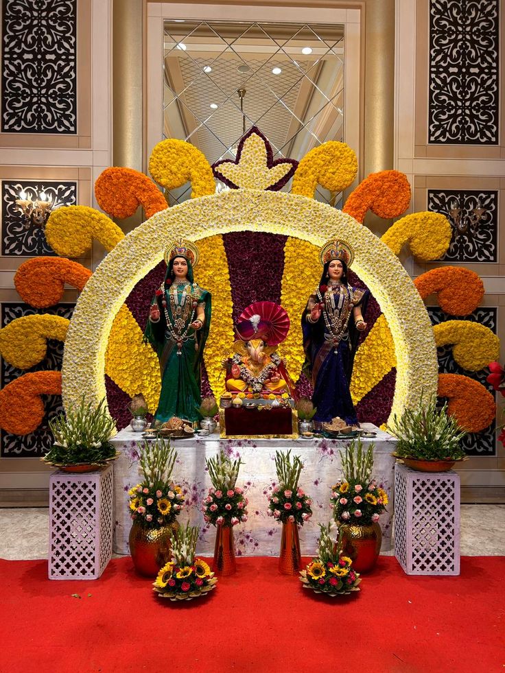 Grand floral wheel Ganpati installation