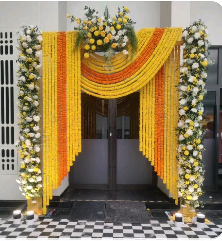Traditional marigold floral entrance installation